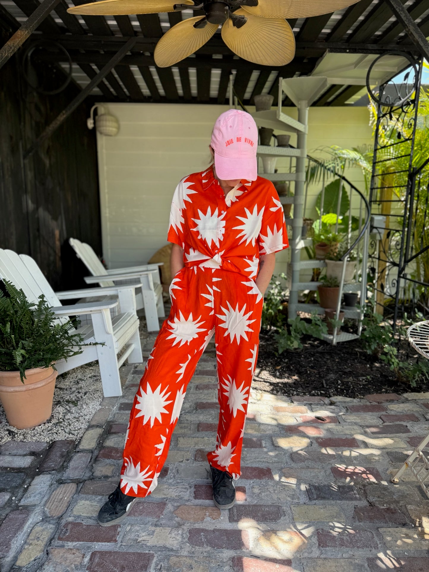 Red-Orange Star Patterned Top