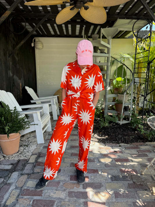 Red-Orange Star Patterned Top